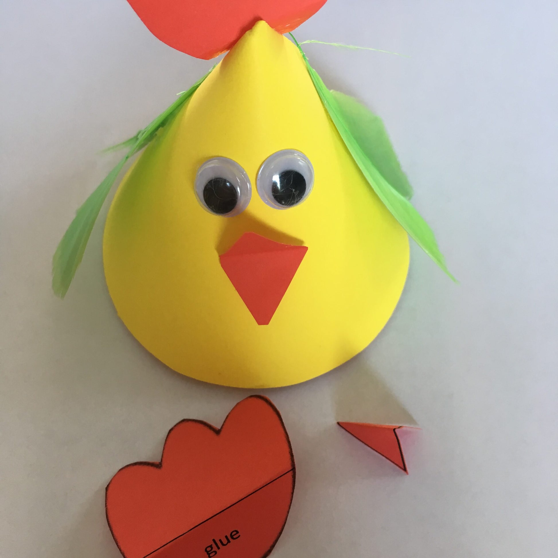 Paper hen for hiding mini chocolate eggs