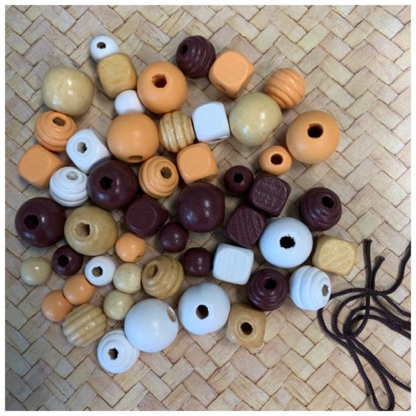 Brown, white natural wooden beads with cord