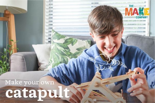 child with catapult craft