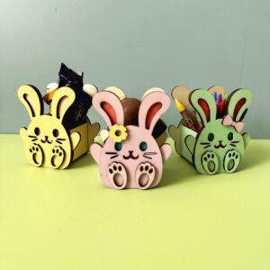 Easter Bunny Box craft 3 bunnies one yellow, one pink and one green filled with treats and stationary