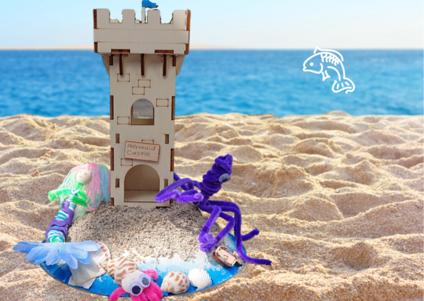A sandcastle with a meraid and a octopus
