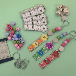 Keyrings, wooden mum signs and wooden beads for mothers day crafts